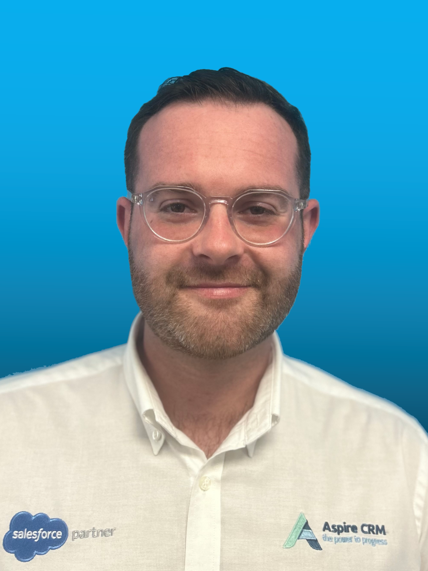 Aspire CRM employee headshot in branded clothing Aspire CRM employee headshot in branded clothing
