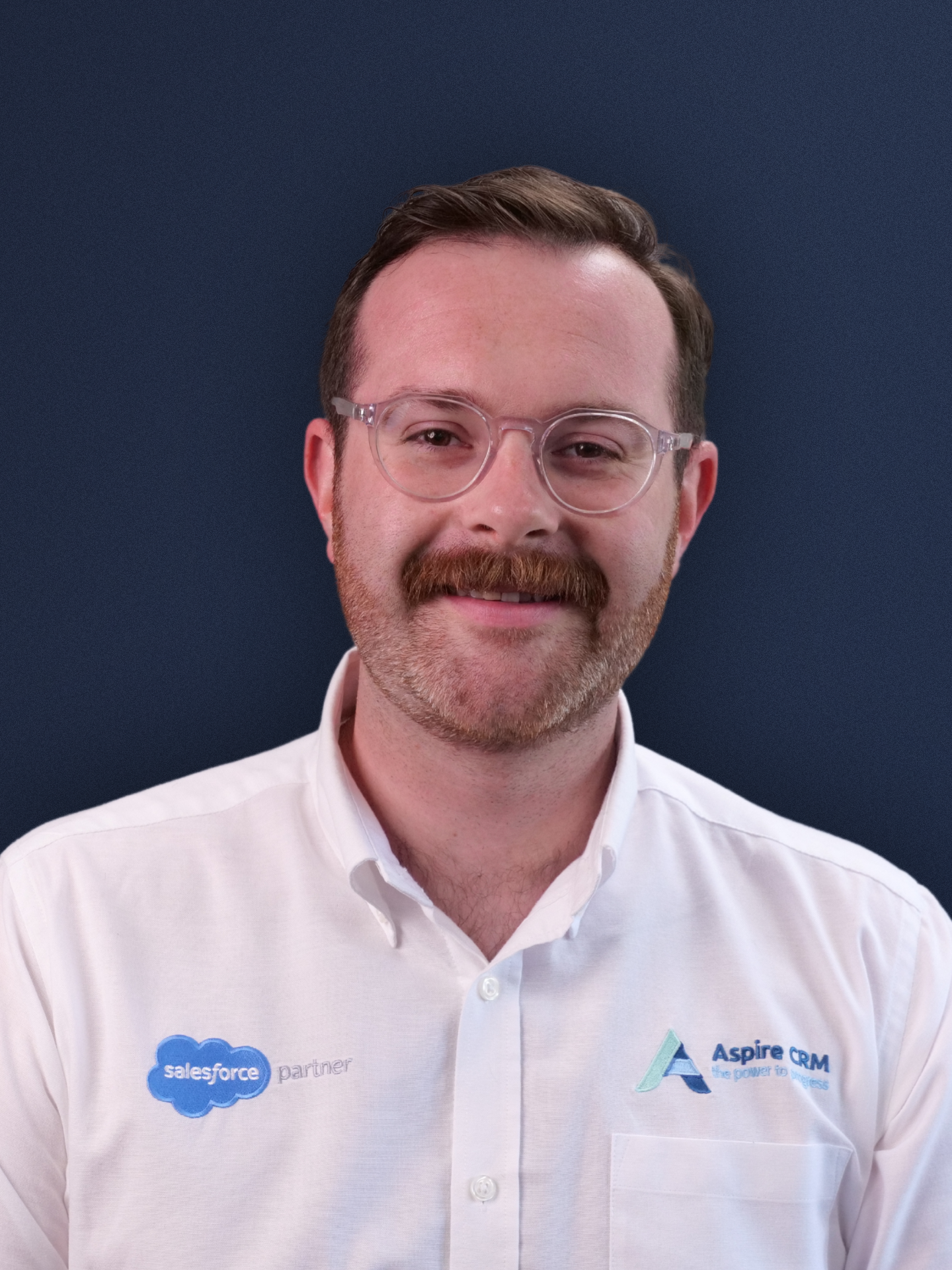 Aspire CRM employee headshot in branded clothing Aspire CRM employee headshot in branded clothing