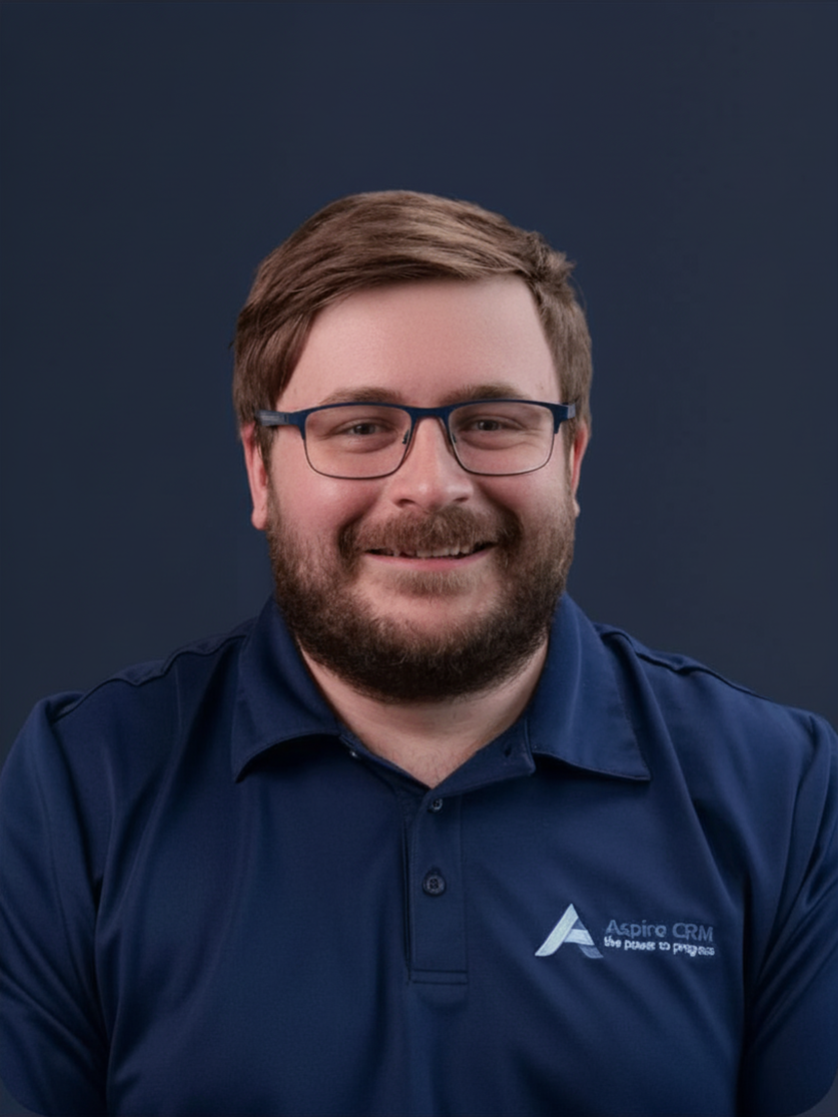 Aspire CRM employee headshot in branded clothing 